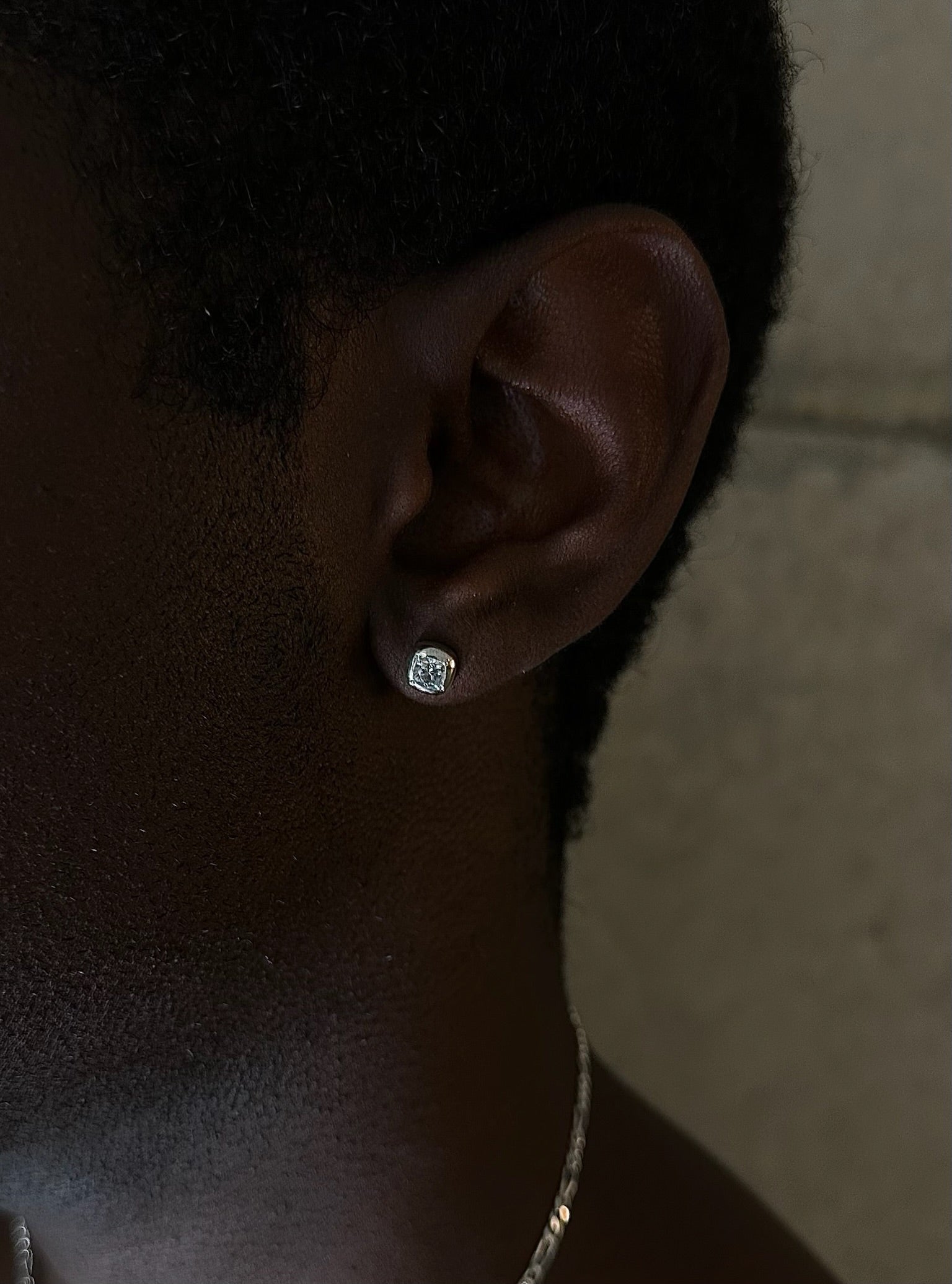 SILVER M ROACH STUDS